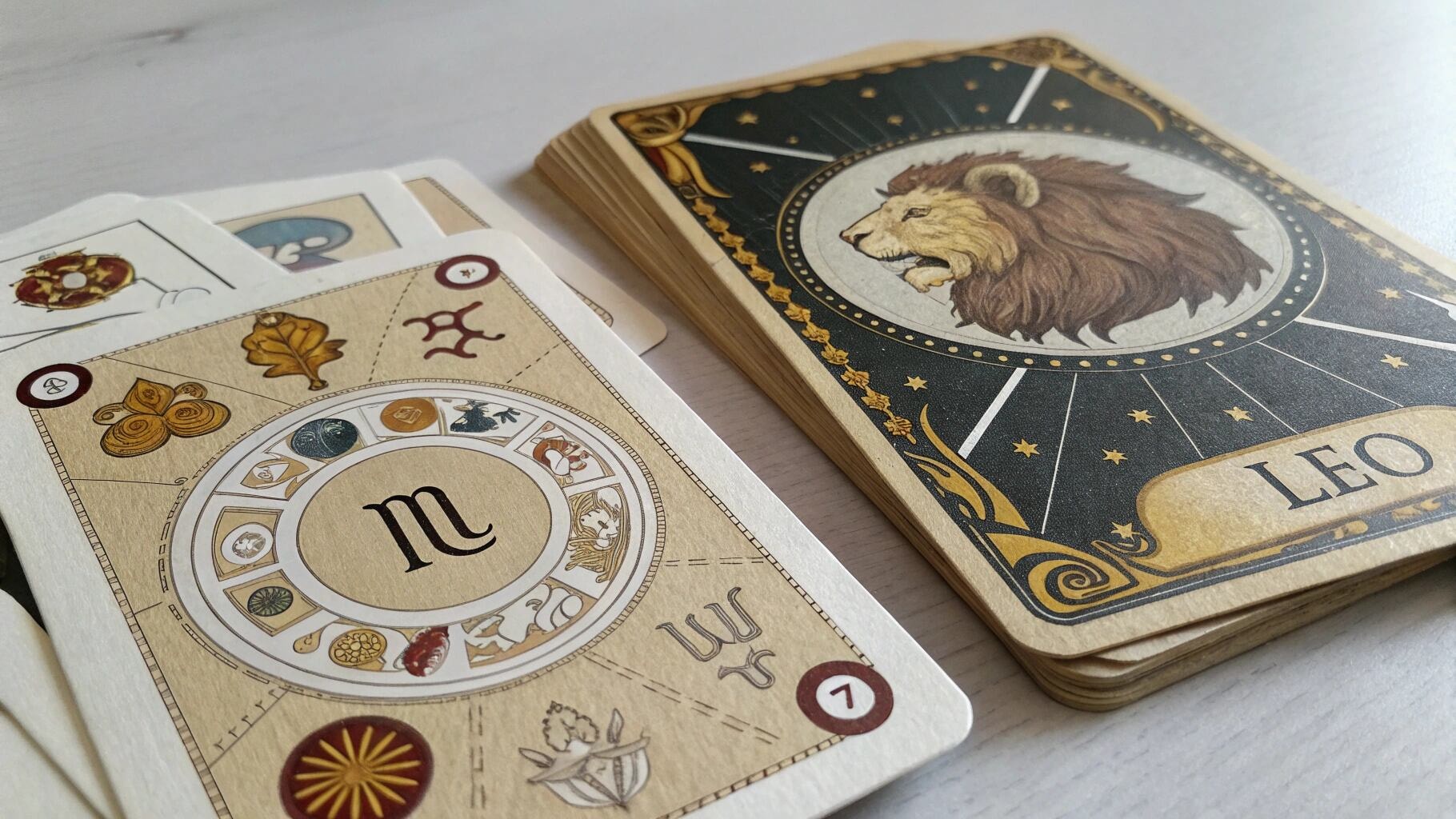 Tarot cards featuring the Leo zodiac sign, linked to the August 1st zodiac personality and energy