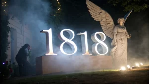 1818 angel number with an angel